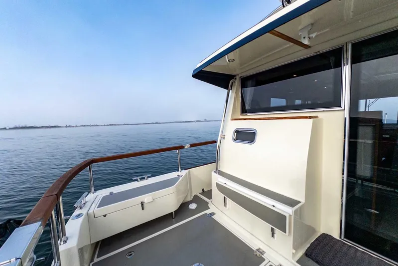  Yacht Photos Pics 2020 Targa 32 boat deck with ocean view, featuring sleek design and modern amenities.