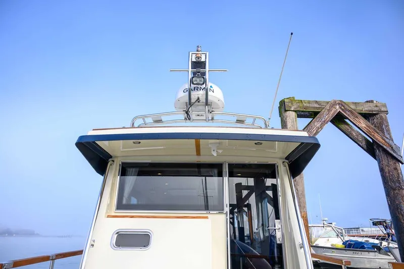  Yacht Photos Pics Targa 32 boat, 2020 model, docked with clear blue sky background.