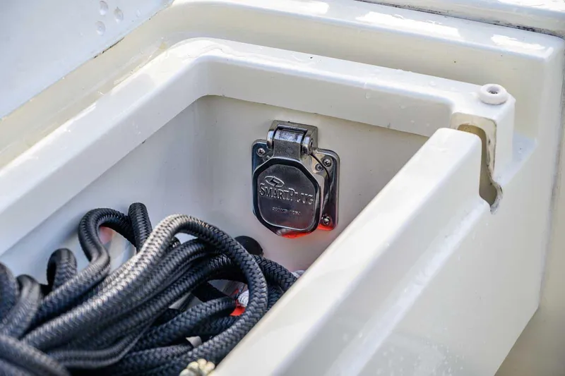  Yacht Photos Pics Targa 32 (2020) boat compartment with SmartPlug and coiled rope.