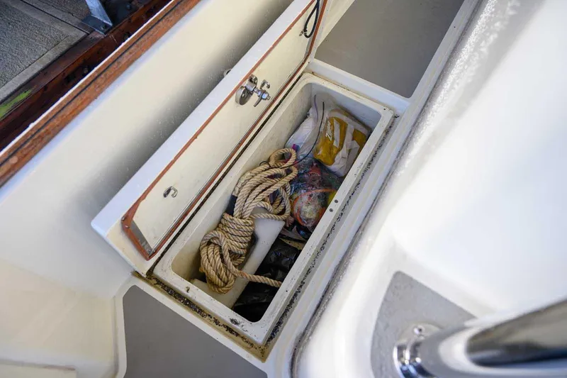  Yacht Photos Pics Storage compartment on 2020 Targa 32 boat with rope and supplies.