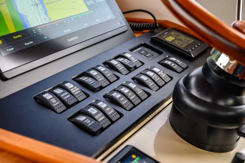  Yacht Photos Pics Control panel of 2020 Targa 32 boat with Garmin navigation system and switches.