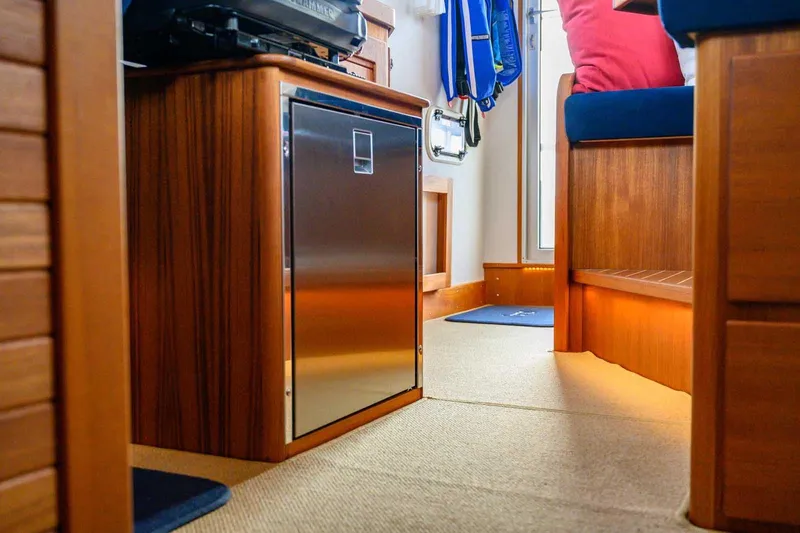  Yacht Photos Pics Interior of 2020 Targa 32 boat with wooden cabinetry and modern design.