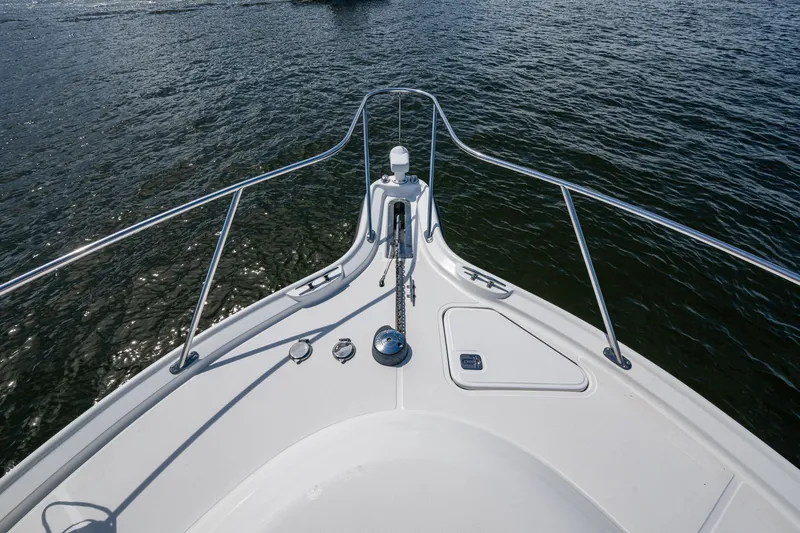  Yacht Photos Pics Bow view of 2008 Tiara Yachts 3200 Open on water, featuring sleek railings.