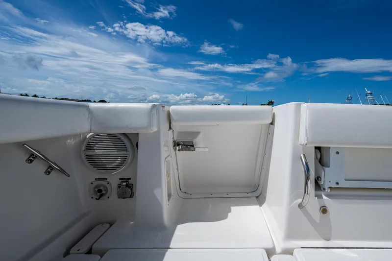  Yacht Photos Pics 2008 Tiara Yachts 3200 Open deck with white seating and blue sky background.