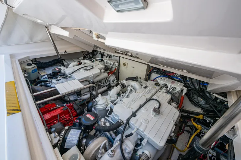  Yacht Photos Pics Engine compartment of a 2008 Tiara Yachts 3200 Open, showcasing dual engines and wiring.