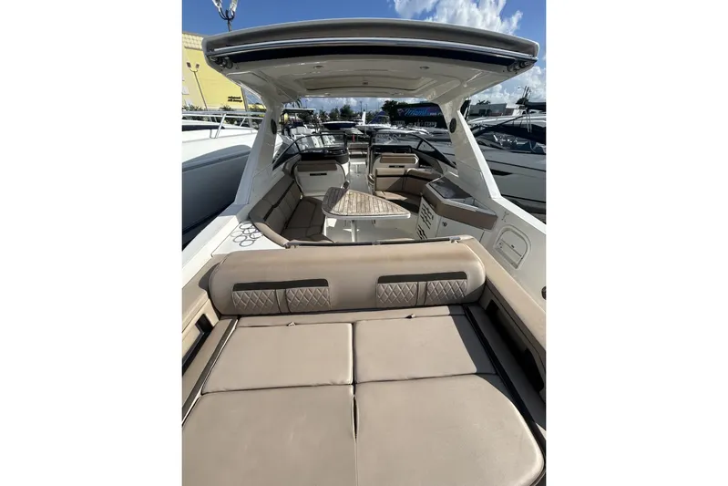  Yacht Photos Pics 2017 Sea Ray SLX 310 Outboard boat interior with luxurious seating and modern design.