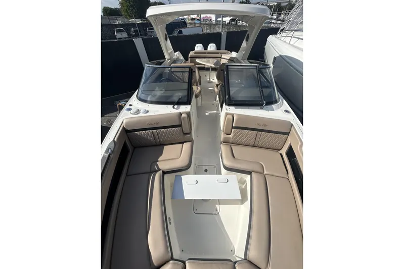  Yacht Photos Pics 2017 Sea Ray SLX 310 Outboard boat with spacious seating and sleek design.