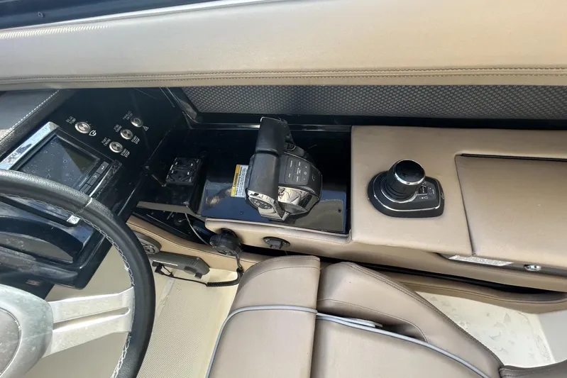  Yacht Photos Pics 2017 Sea Ray SLX 310 Outboard helm with controls and steering wheel.