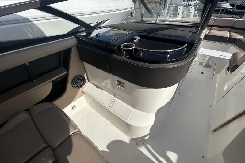  Yacht Photos Pics 2017 Sea Ray SLX 310 Outboard interior with seating and speaker detail.