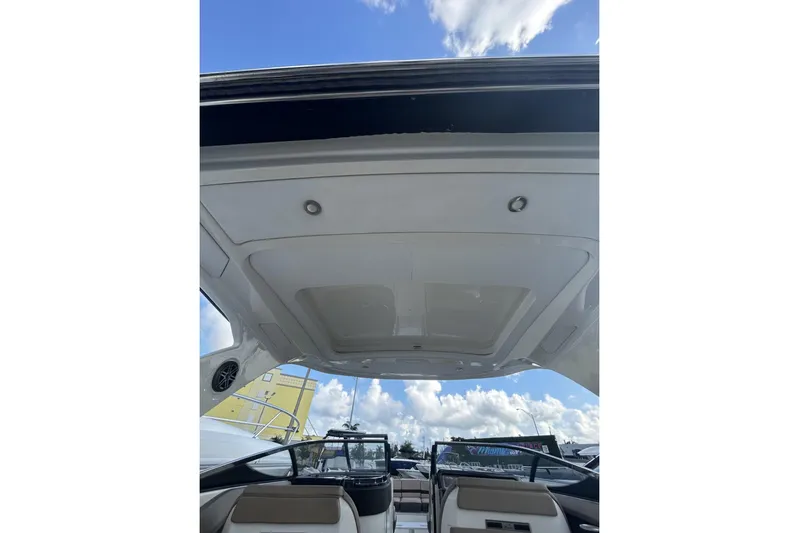  Yacht Photos Pics 2017 Sea Ray SLX 310 Outboard boat interior with open sky view.