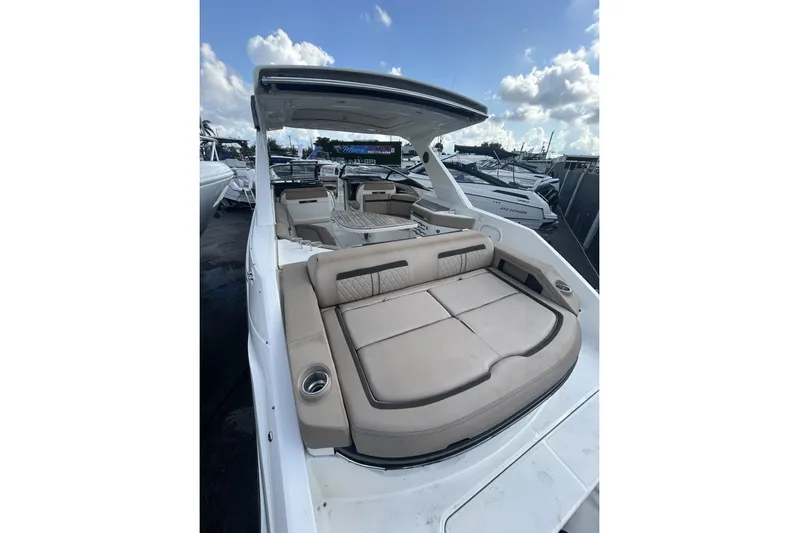  Yacht Photos Pics 2017 Sea Ray SLX 310 Outboard boat with spacious seating and sleek design.