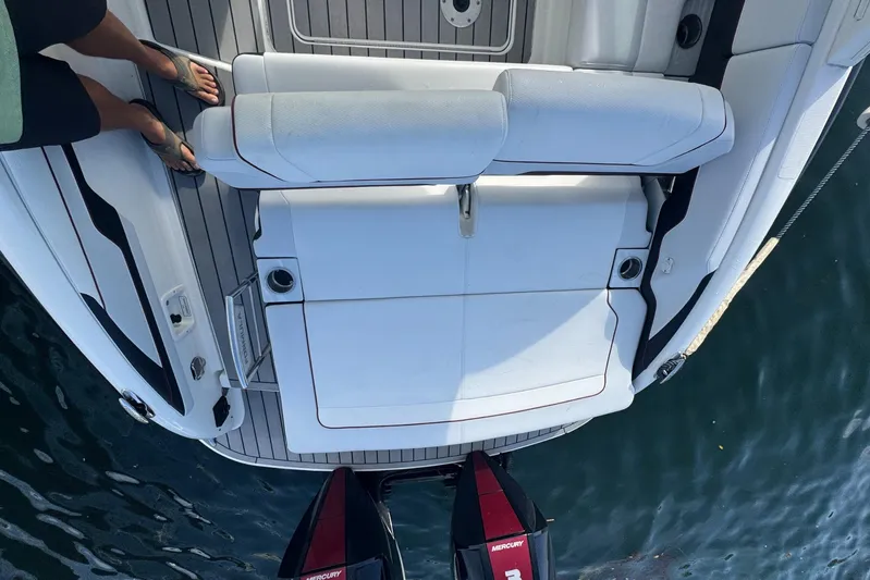  Yacht Photos Pics 2022 Formula 310 Bowrider OB boat with spacious seating and Mercury outboard engines.