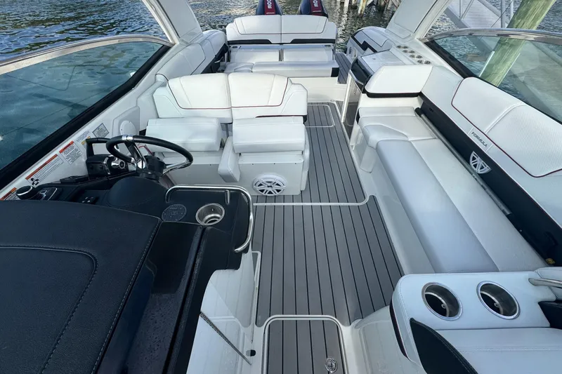 Yacht Photos Pics 2022 Formula 310 Bowrider OB interior with luxurious seating and modern design.