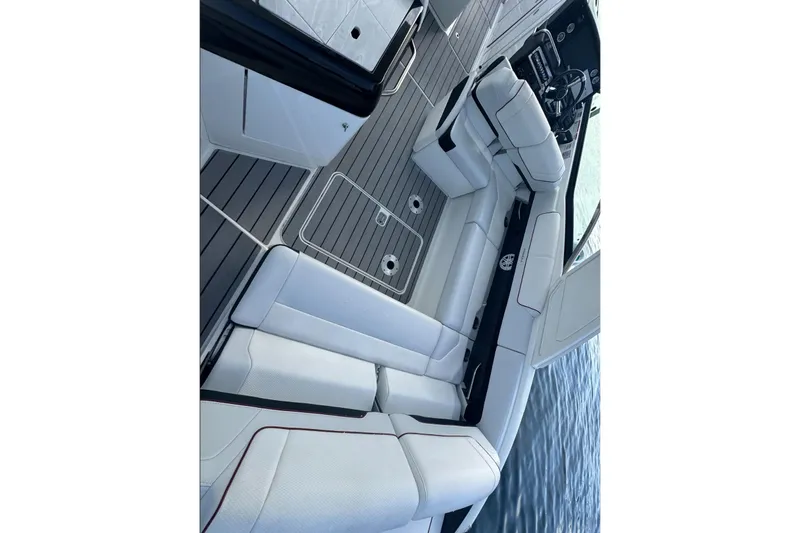  Yacht Photos Pics 2022 Formula 310 Bowrider OB interior with sleek seating and modern design on the water.