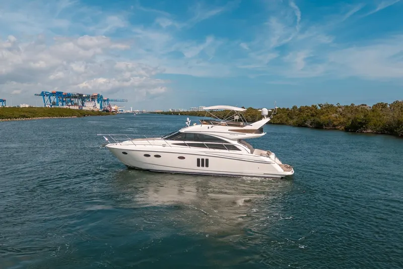 Ahdorned Yacht Photos Pics Luxury Princess F54 yacht cruising on a scenic waterway, 2009 model.