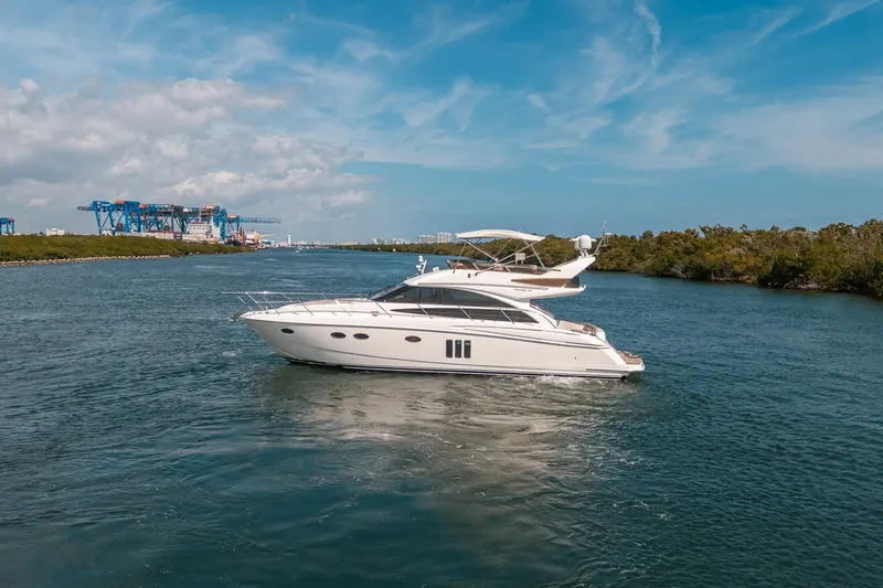 Ahdorned Yacht Photos Pics Luxury Princess F54 yacht cruising on a scenic waterway, 2009 model.