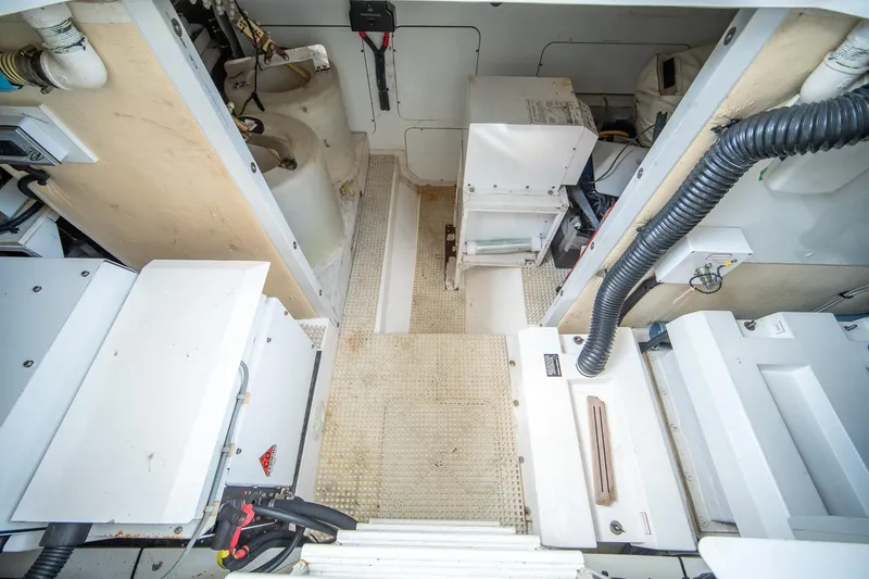 Ahdorned Yacht Photos Pics Engine room of 2009 Princess F54 yacht with mechanical equipment and wiring.