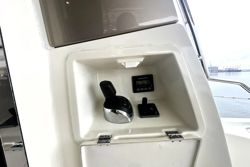 Cyctrade Yacht Photos Pics Control panel of a 2017 Prestige 500 yacht with joystick and display.