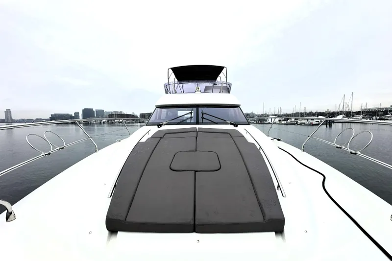 Cyctrade Yacht Photos Pics 2017 Prestige 500 yacht on calm water, showcasing sleek design and spacious deck.