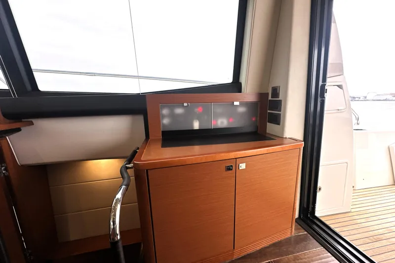 Cyctrade Yacht Photos Pics Interior of 2017 Prestige 500 yacht with wooden cabinetry and modern design elements.