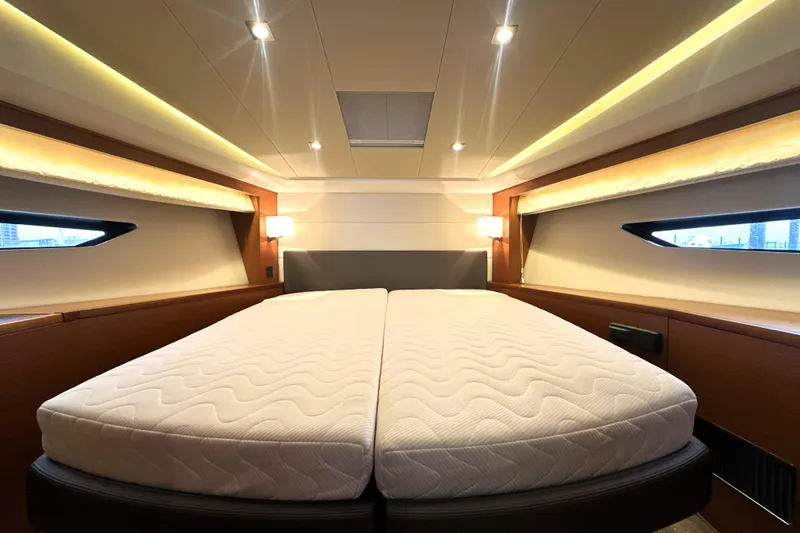 Cyctrade Yacht Photos Pics Luxurious bedroom interior of 2017 Prestige 500 yacht with modern lighting and comfortable bedding.