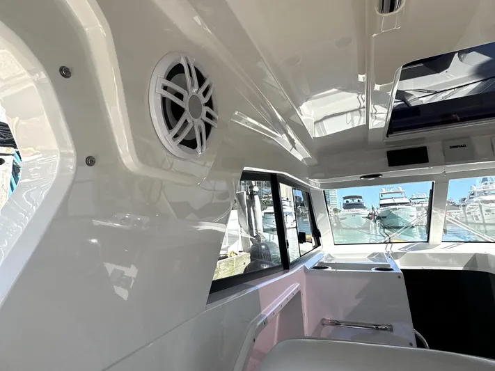 Lizzie Yacht Photos Pics Interior of 2020 Protector TARGA 380 boat, featuring sleek design and modern amenities.