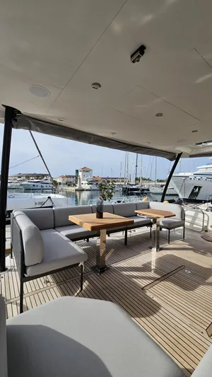 Diamond Si Yacht Photos Pics Luxurious 2024 Prestige M48 yacht deck with elegant seating and marina view.