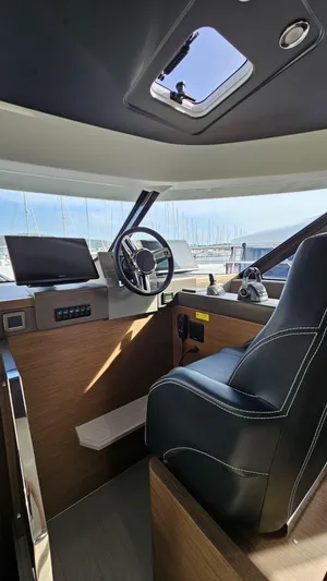 Diamond Si Yacht Photos Pics 2024 Prestige M48 yacht cockpit with modern steering and navigation controls.