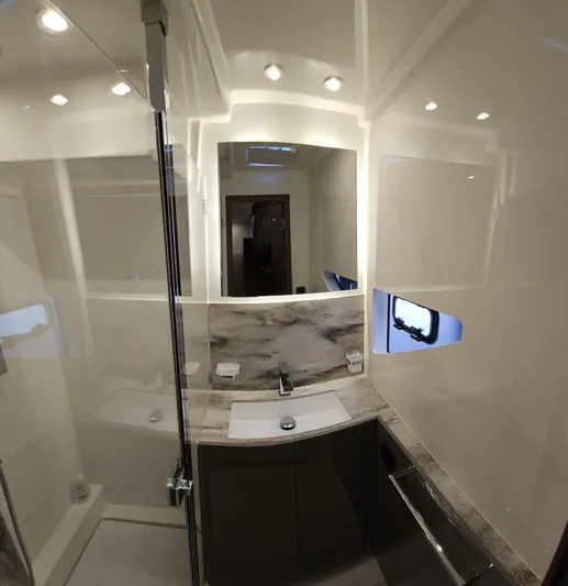 Diamond Si Yacht Photos Pics Luxurious bathroom in 2024 Prestige M48 yacht with modern fixtures and elegant design.