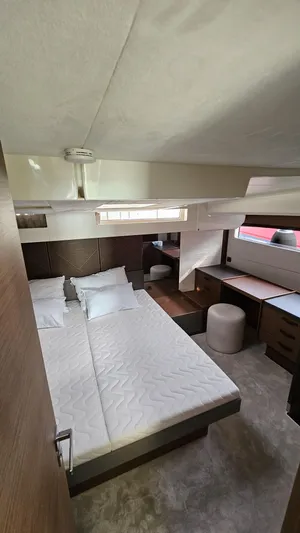 Diamond Si Yacht Photos Pics Luxurious bedroom interior of 2024 Prestige M48 yacht with modern furnishings and elegant design.