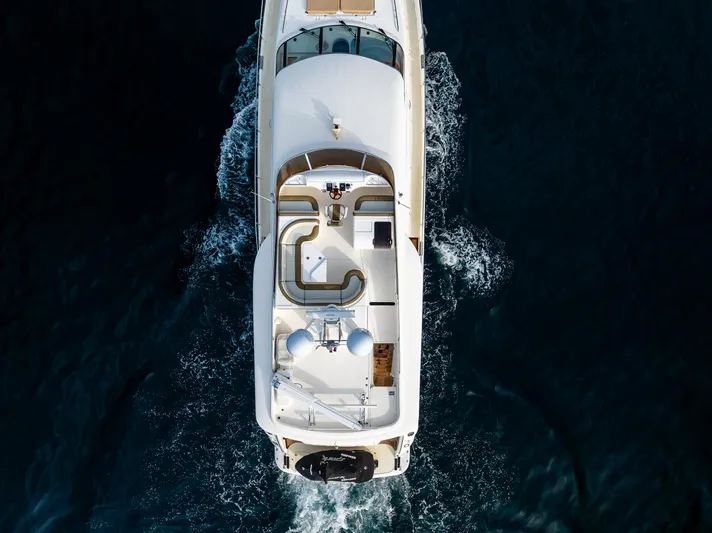 Pearl Yacht Photos Pics Aerial view of 2002 Viking Princess 72 SportCruiser yacht cruising on water.