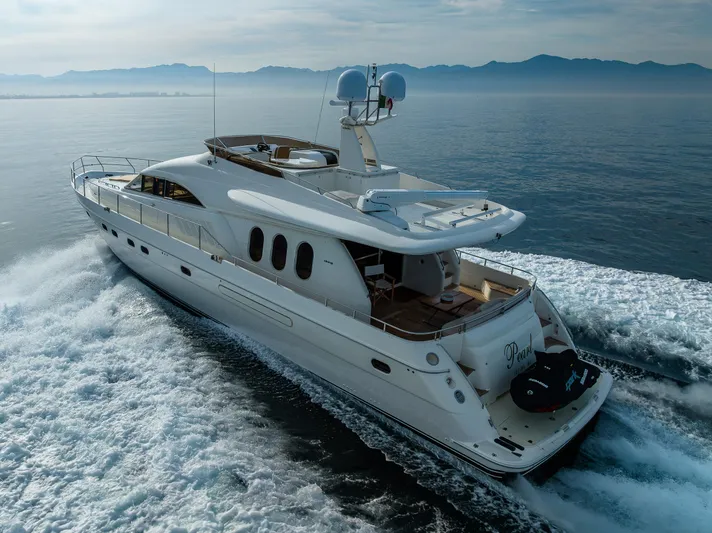 Pearl Yacht Photos Pics 2002 Viking Princess 72 SportCruiser yacht cruising on open water.