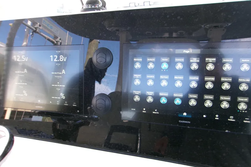  Yacht Photos Pics Dashboard of 2025 Sportsman Open 322 Center Console with Garmin displays and controls.