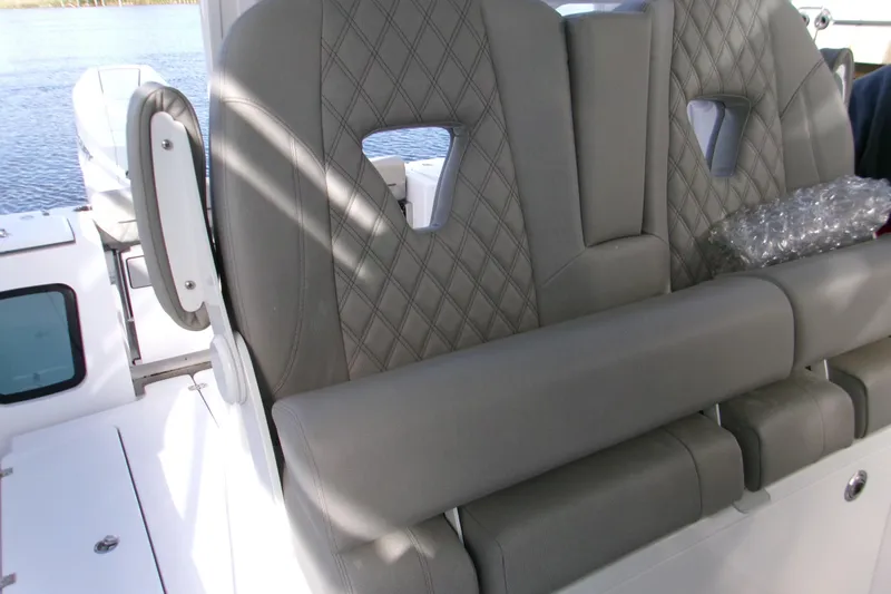  Yacht Photos Pics 2025 Sportsman Open 322 Center Console boat seats with diamond stitching detail.