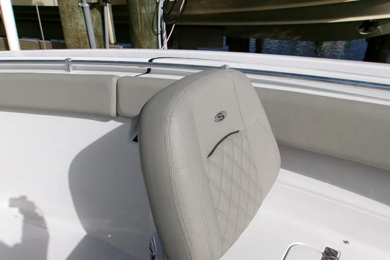  Yacht Photos Pics 2025 Sportsman Open 322 Center Console boat seat with gray upholstery and diamond stitching.