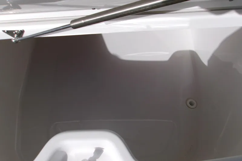  Yacht Photos Pics 2025 Sportsman Open 322 Center Console storage compartment with hydraulic lift support.