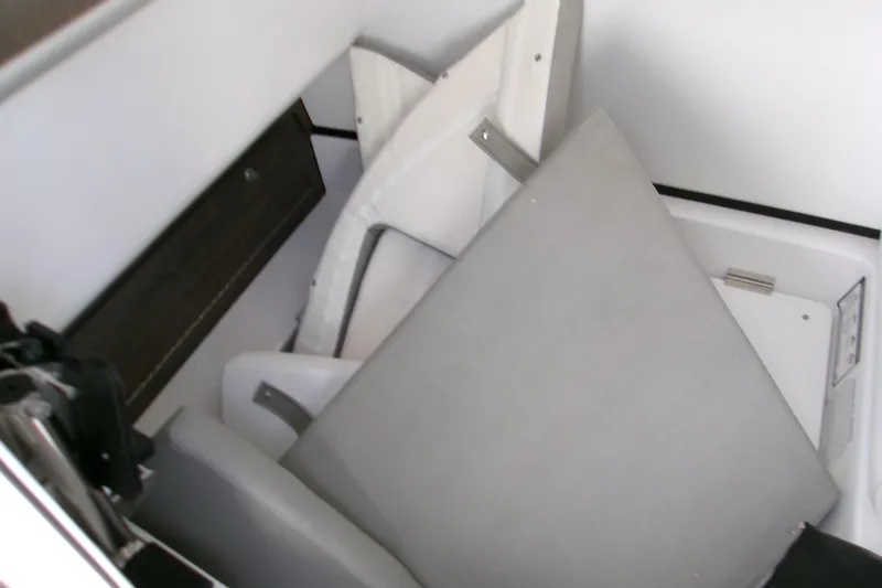  Yacht Photos Pics 2025 Sportsman Open 322 Center Console interior storage with cushions.