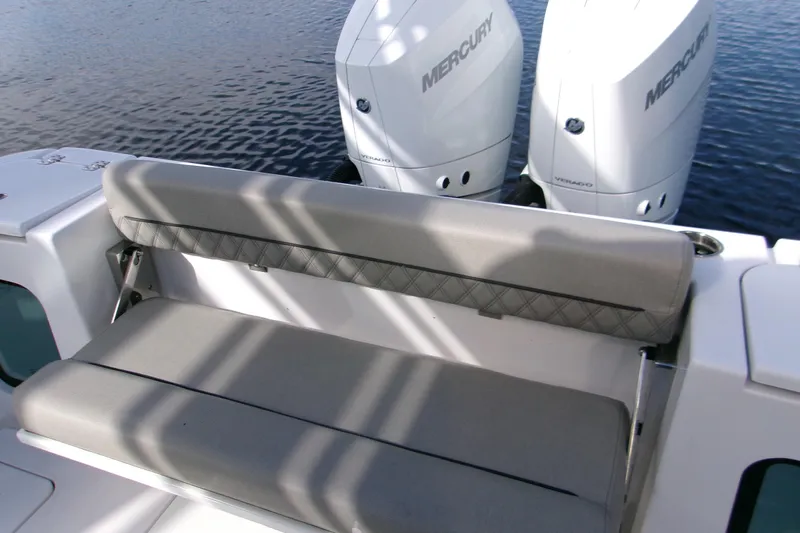  Yacht Photos Pics 2025 Sportsman Open 322 Center Console with dual Mercury Verado engines and cushioned seating.