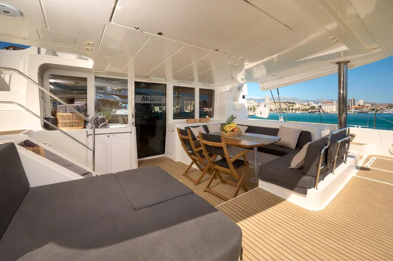  Yacht Photos Pics Luxurious 2019 Lagoon 52 F yacht interior with seating area and ocean view.