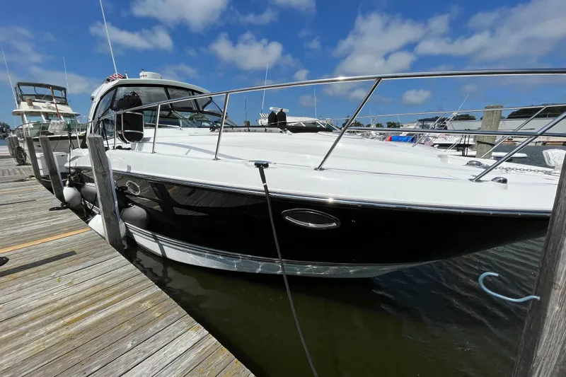  Yacht Photos Pics 2015 Monterey 415 Sport Yacht docked at marina under blue sky.