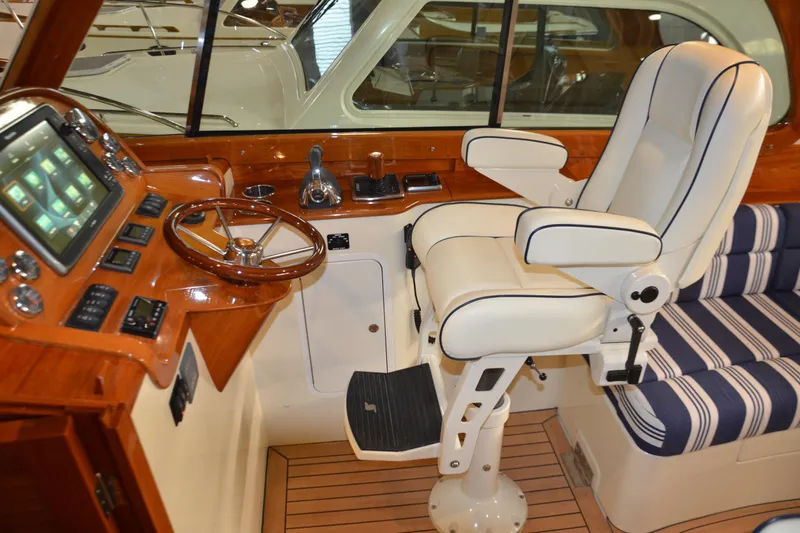 Standish Yacht Photos Pics 2017 Hinckley Picnic Boat 37 MKIII helm with luxurious seating and advanced controls.