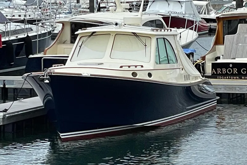 Standish Yacht Photos Pics 2017 Hinckley Picnic Boat 37 MKIII docked in a marina.