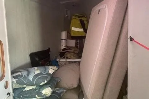 Endeavour Yacht Photos Pics Storage area in a 2020 Fountaine Pajot Saona 47 with cushions and equipment.