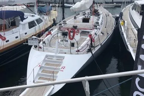 Josefina Yacht Photos Pics 1989 Nautor Swan 86 yacht docked, available for sale, featuring sleek design and spacious deck.