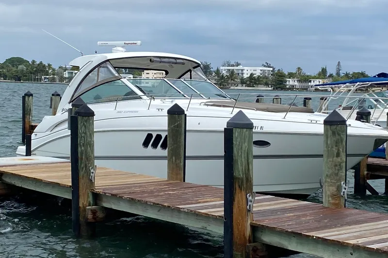 Life Of Leisure II Yacht Photos Pics 2013 Cruisers Yachts 380 Express docked by the waterfront.