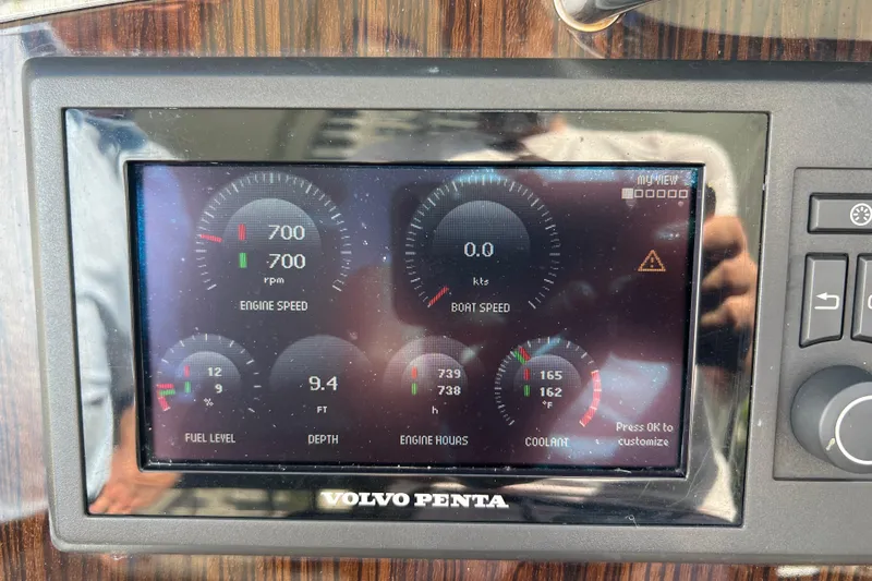 Life Of Leisure II Yacht Photos Pics Volvo Penta display on 2013 Cruisers Yachts 380 Express showing engine and boat metrics.