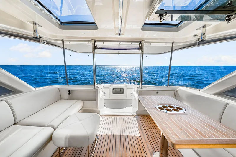  Yacht Photos Pics Luxurious interior of 2022 Riviera 505 SUV yacht with ocean view.