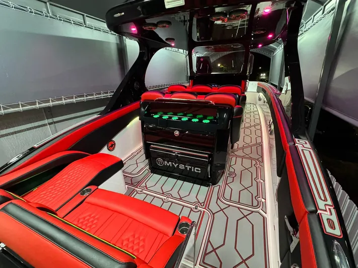  Yacht Photos Pics 2018 Mystic Powerboats M4200 interior with red seating and modern design.