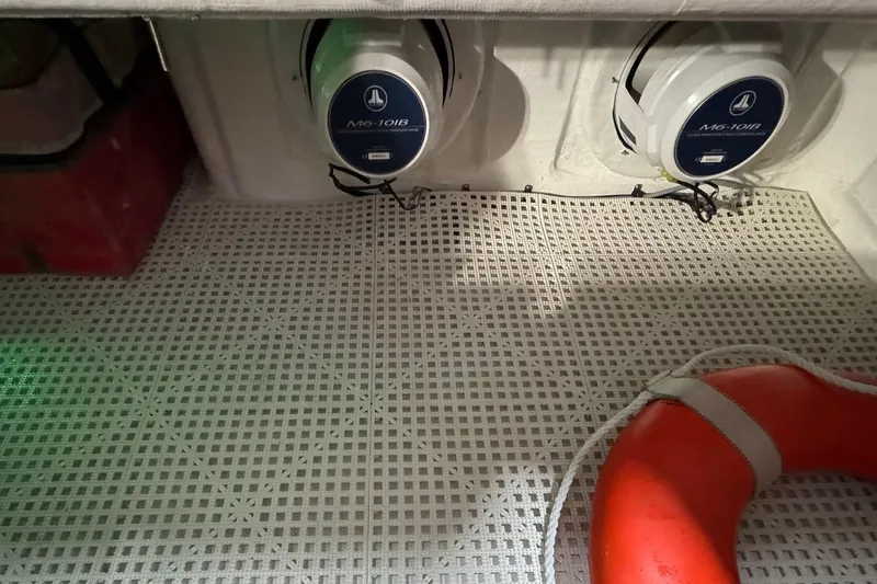  Yacht Photos Pics 2018 Mystic Powerboats M4200 interior with speakers and life preserver.