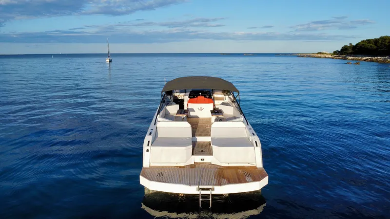 Ischia Yacht Photos Pics 2024 BB Yachts 44 Ischia on calm sea, showcasing sleek design and luxury features.